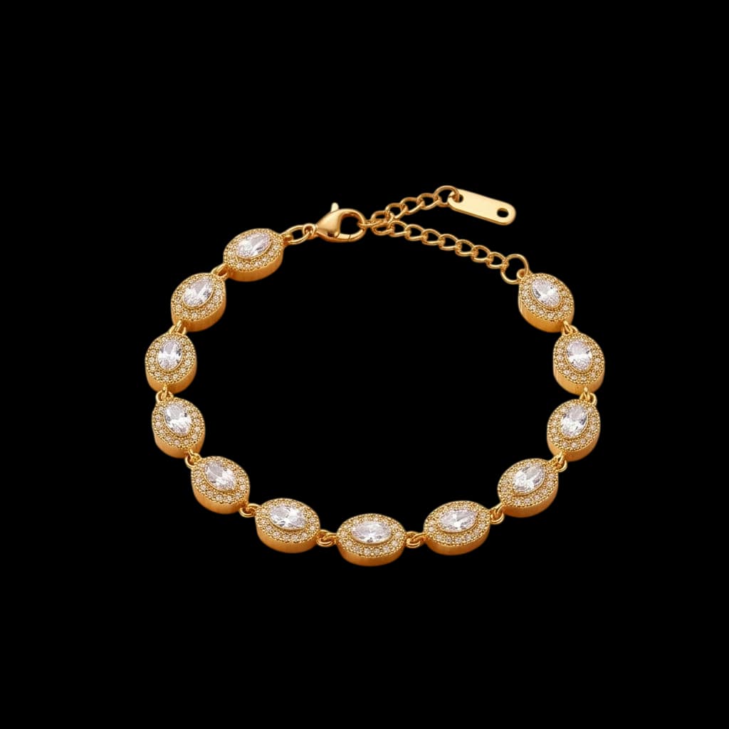 A golden-tone bracelet with oval clear stones surrounded by sparkling halos.